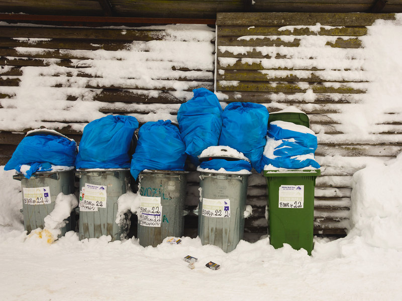 dustbins covered with snow